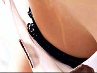 Here we have the dazzling closeups of girl in light summer polka dot dress and also her black downblouse bra